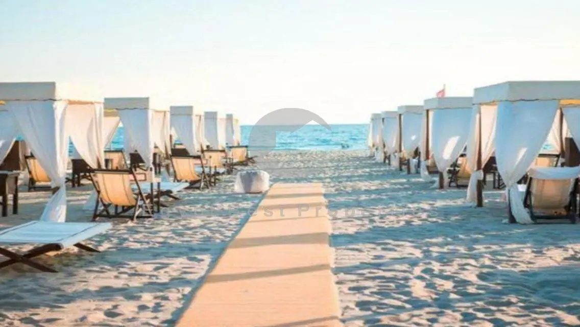 Gated First Row Hotel Apartment with Private Beach
