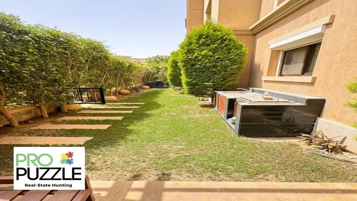 Apartment with garden  in mivida fully Furnished