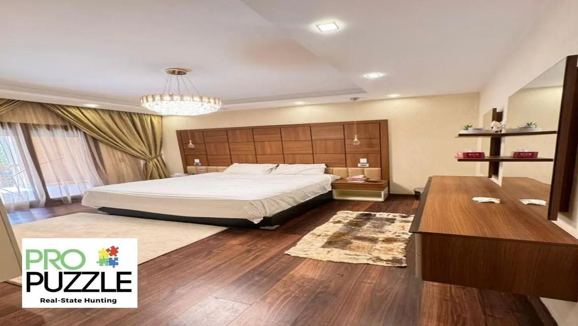 Apartment with garden  in mivida fully Furnished
