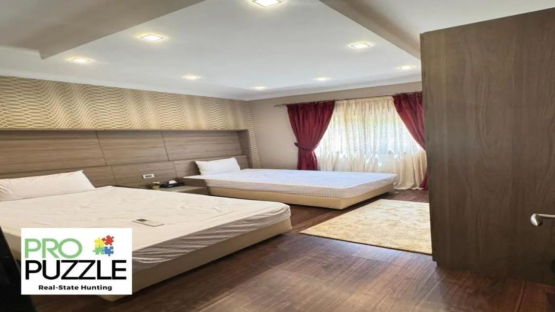 Apartment with garden  in mivida fully Furnished