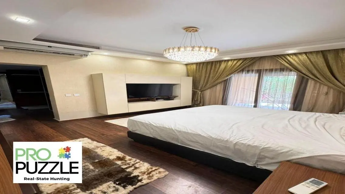 Apartment with garden  in mivida fully Furnished