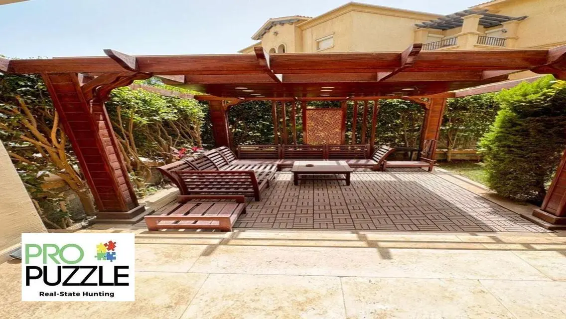 Apartment with garden  in mivida fully Furnished
