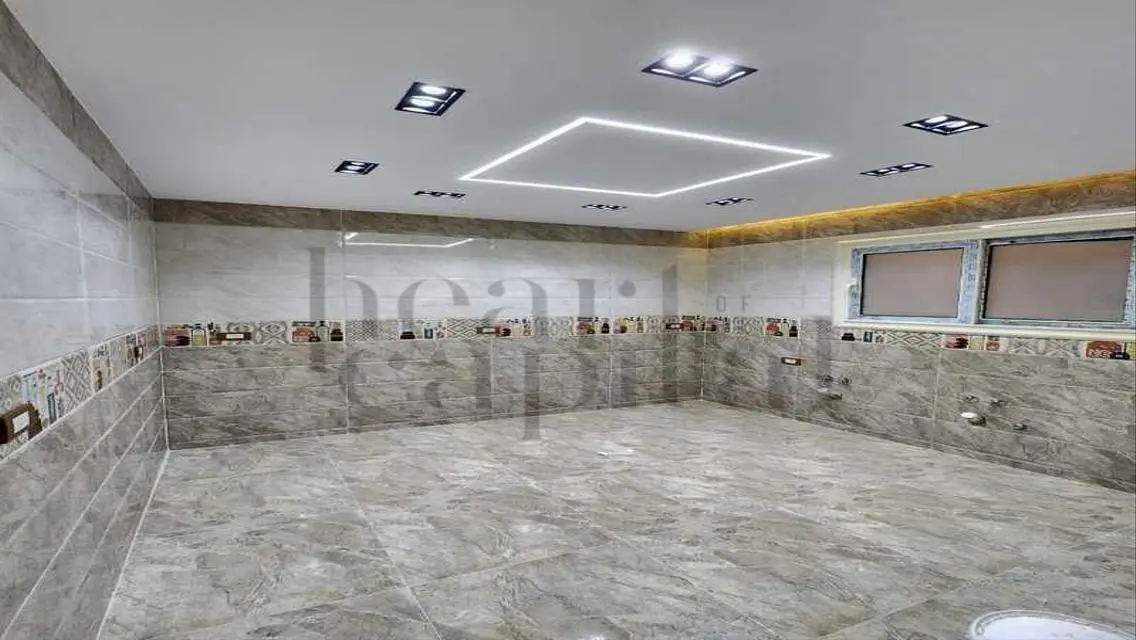 Spacious Garden Apartment for Sale in Al-Khamayel