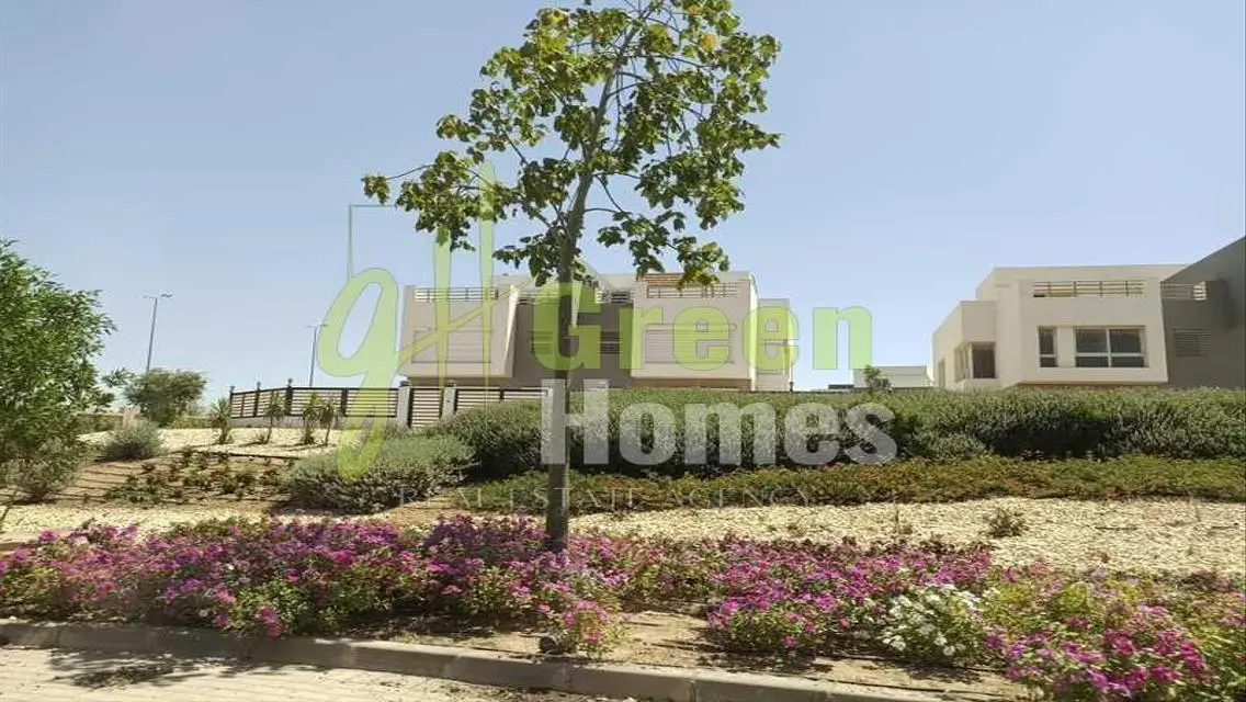 Green Home with Security Guard