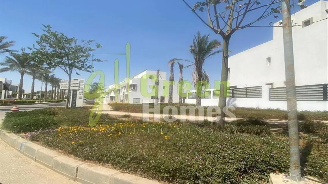 Green Home with Security Guard