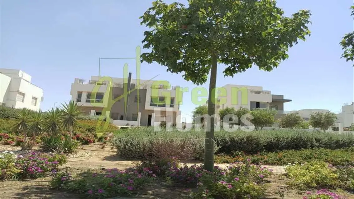 Green Home with Security Guard