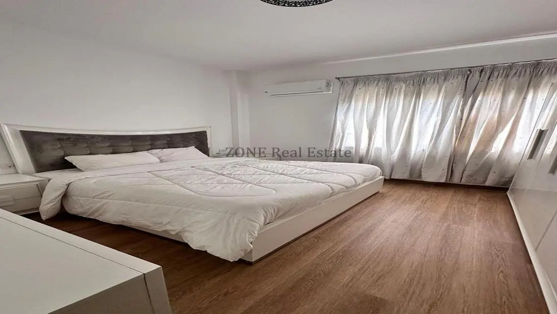 Modern furnished apartment with garden for rent,