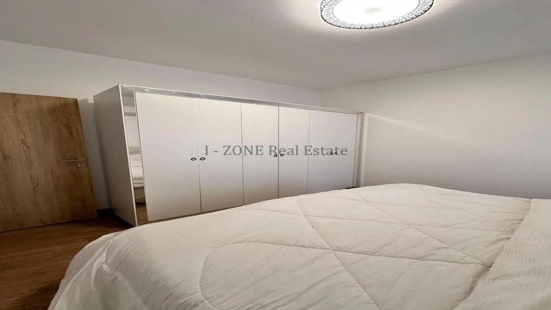Modern furnished apartment with garden for rent,