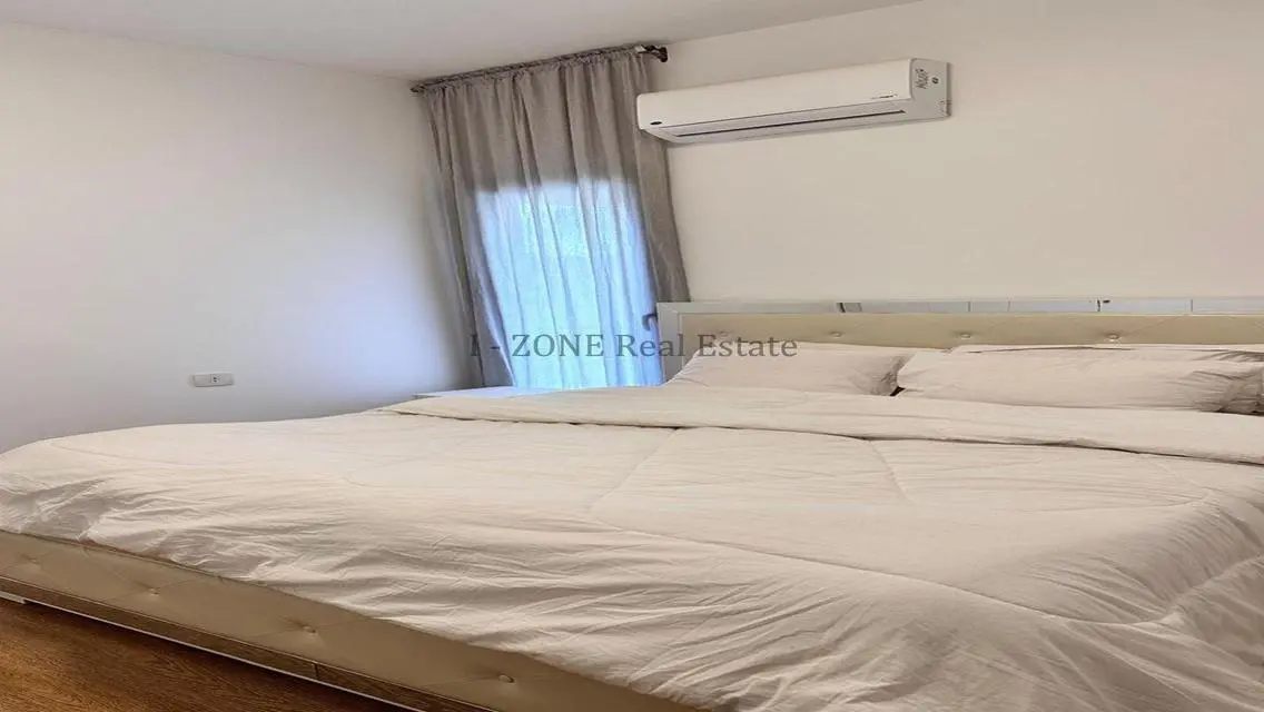 Modern furnished apartment with garden for rent,
