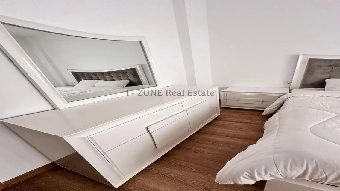 Modern furnished apartment with garden for rent,