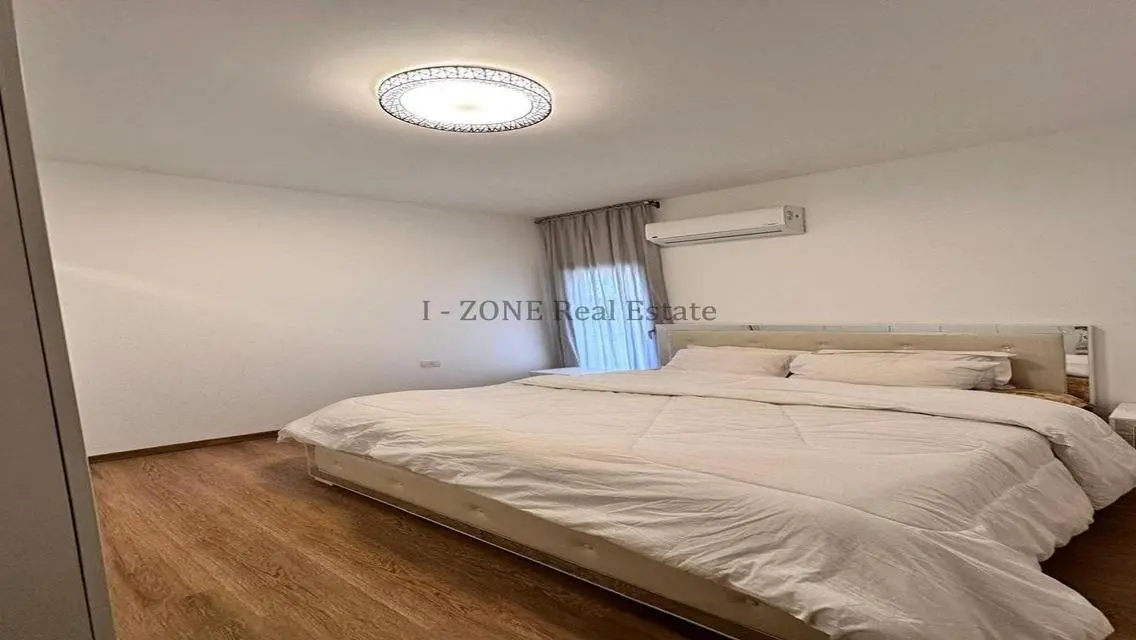 Modern furnished apartment with garden for rent,