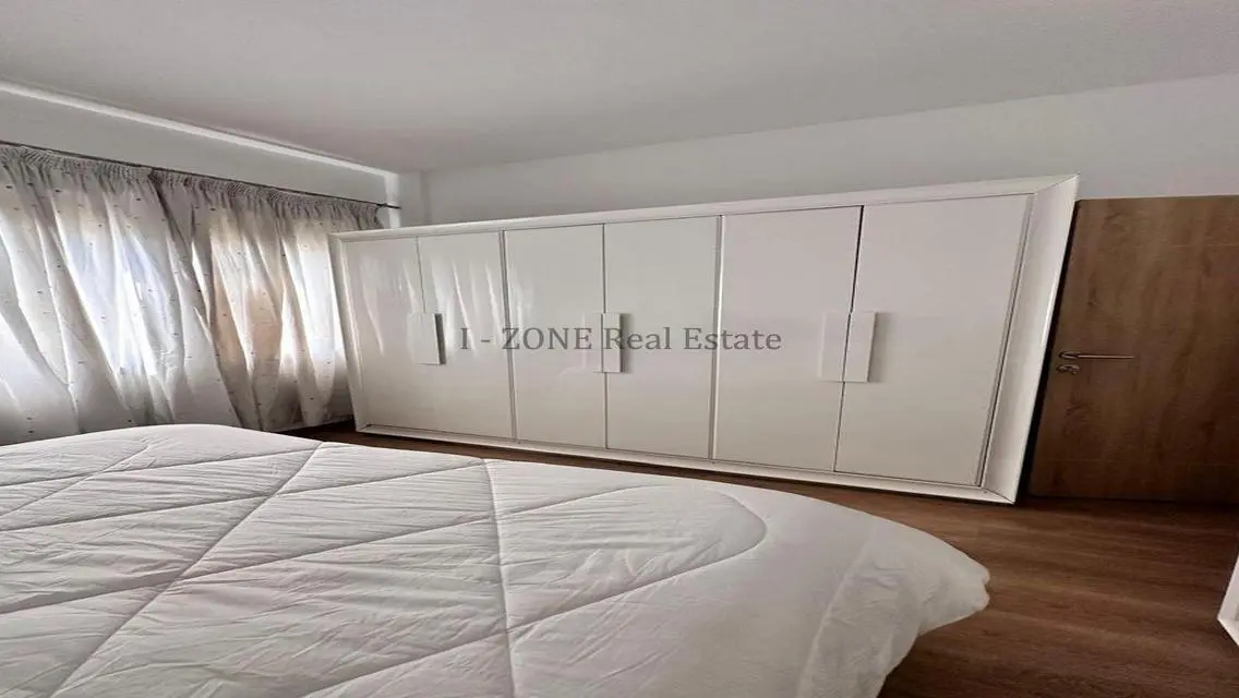 Modern furnished apartment with garden for rent,