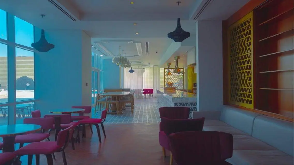 Receive a hotel suite with DP Invest with Hilton .