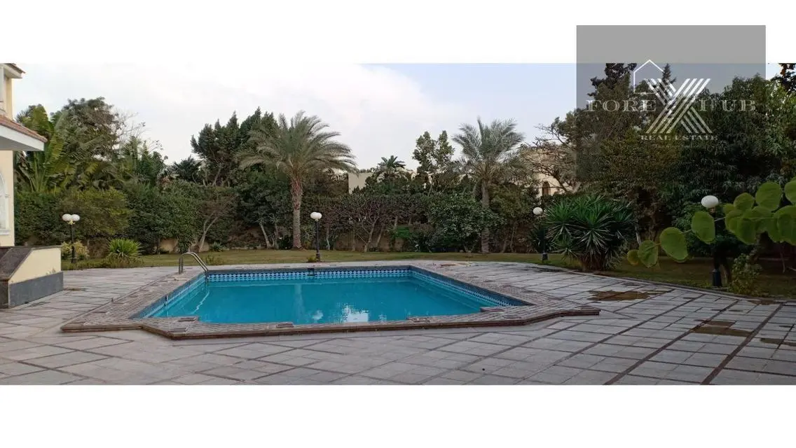 Palace for sale in * Mena Garden city * compound .