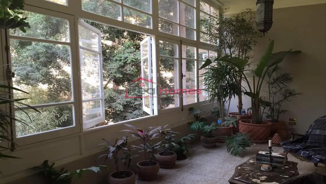 High ceiling renovated apartment unique building
