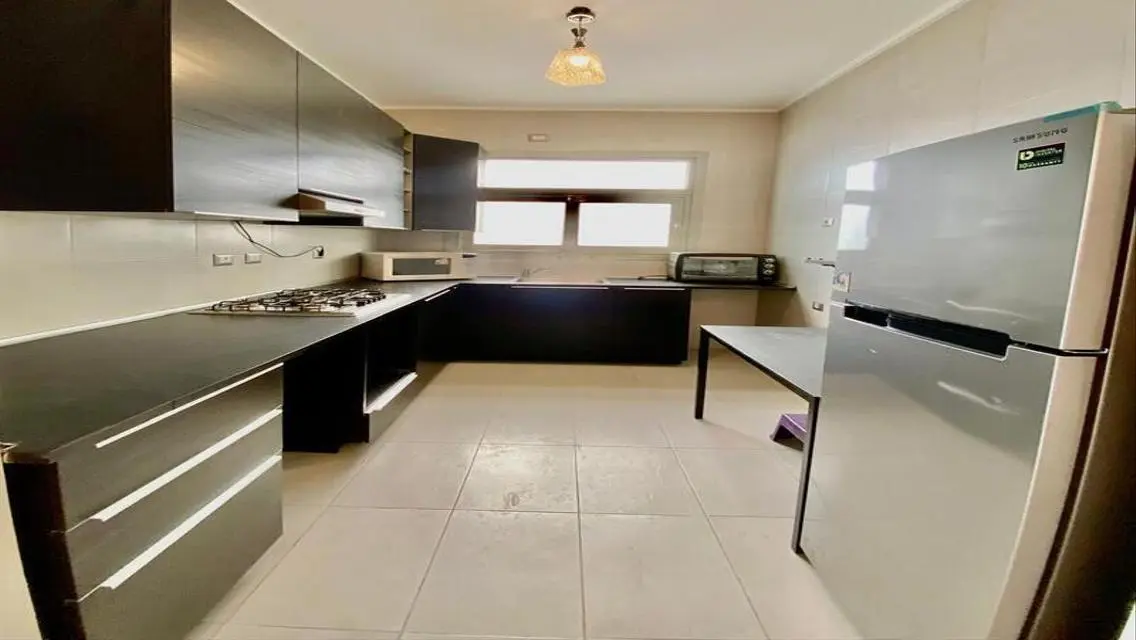 Furnished ground studio with special finishes