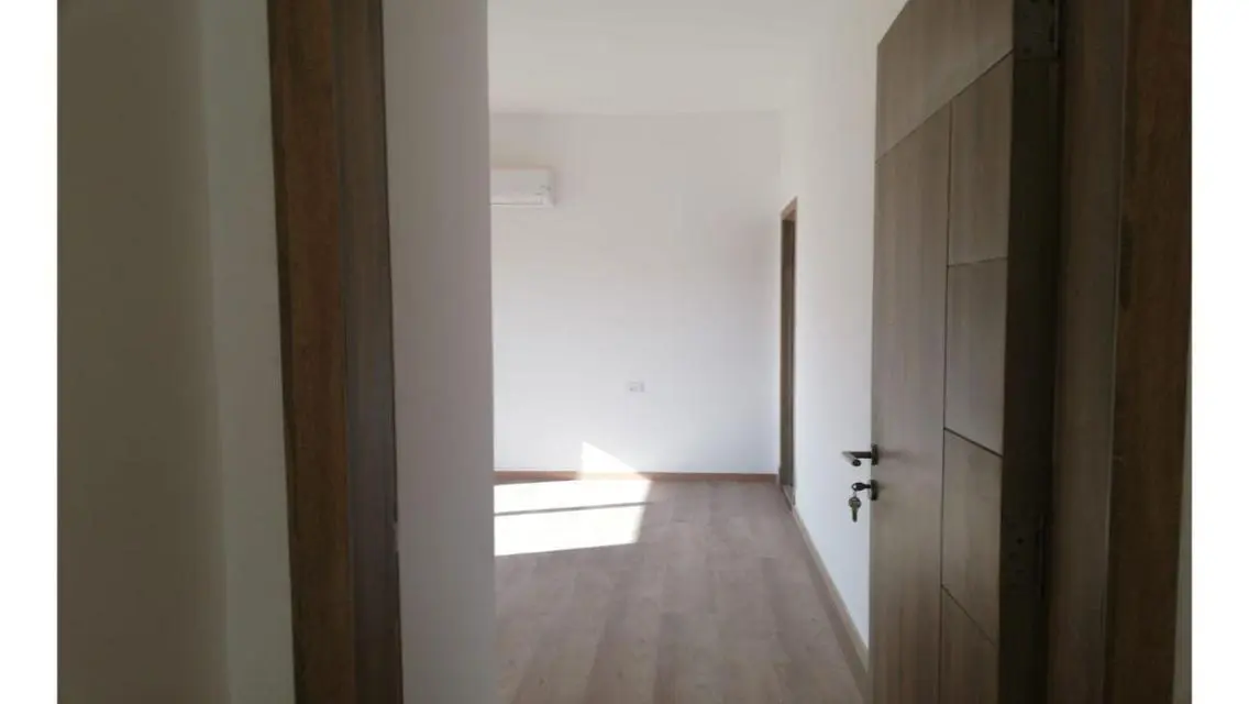 Apartment with kitchen and air conditioners