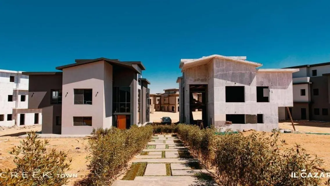 Own a premium townhouse direct access to Suez Road