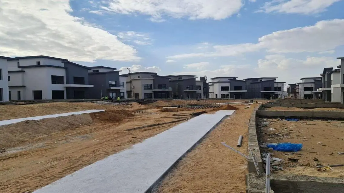 Own a premium townhouse direct access to Suez Road