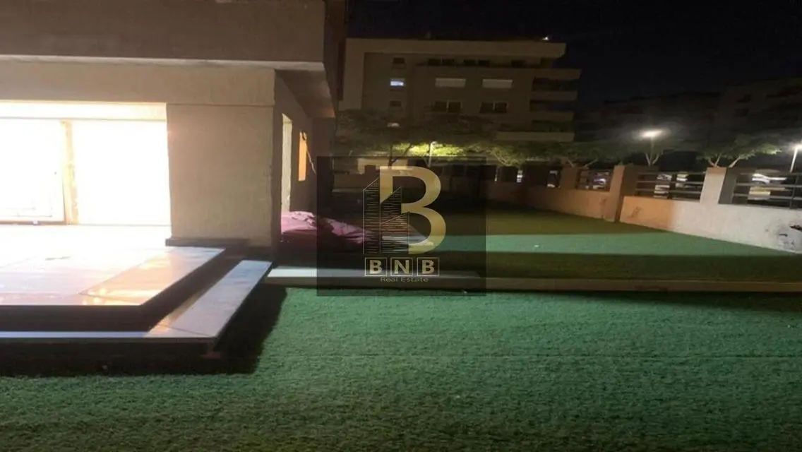 Stunning Apartment with Private Garden and Shared Pool