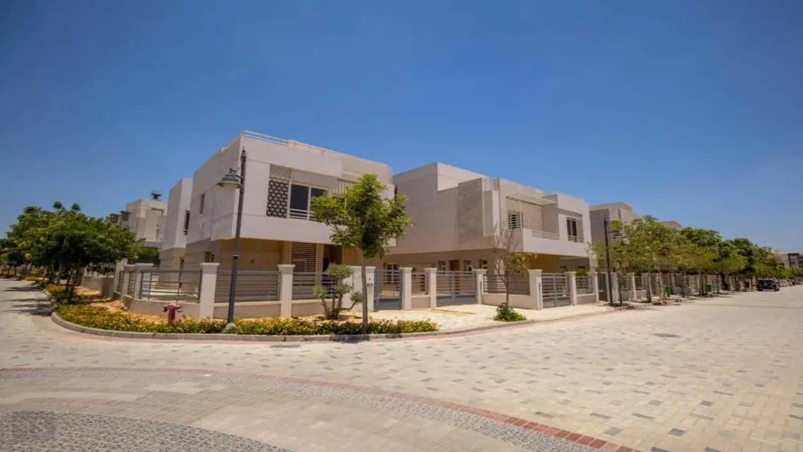 Luxurious Villa with Private Garden and Shared Pool in Prime Location