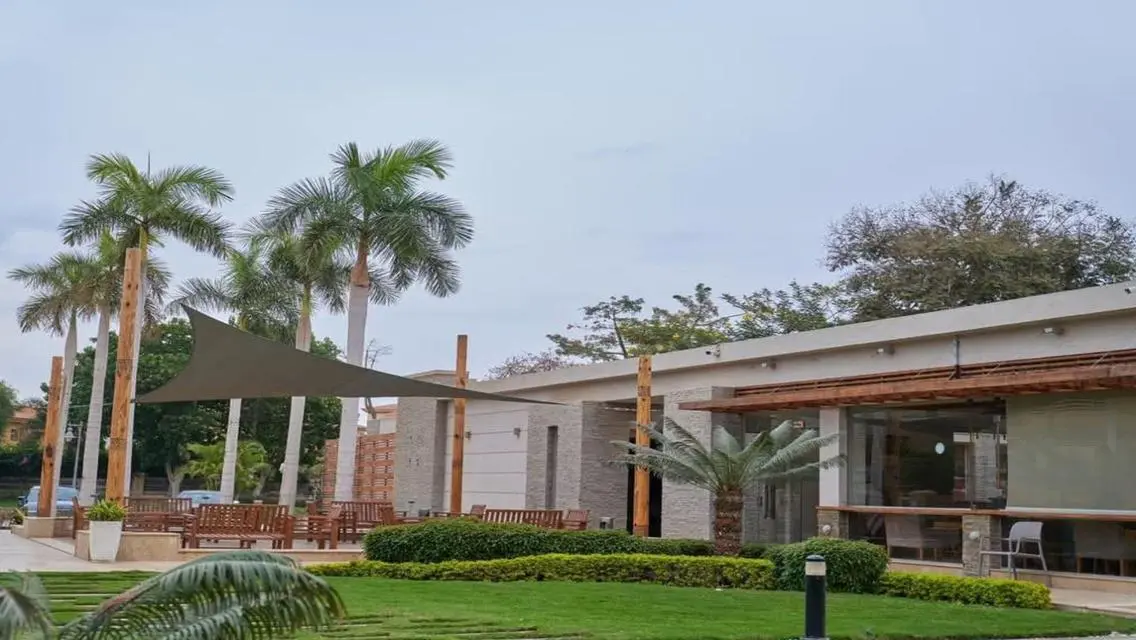 Luxurious Villa with Private Garden and Shared Pool in Prime Location