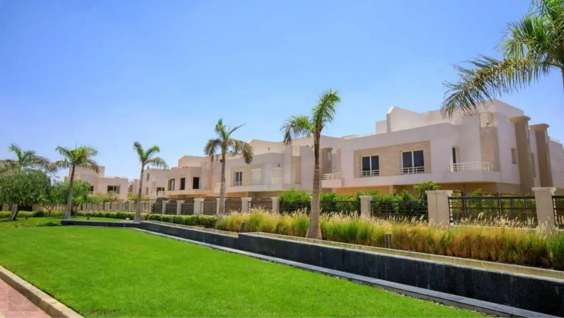 Luxurious Villa with Private Garden and Shared Pool in Prime Location