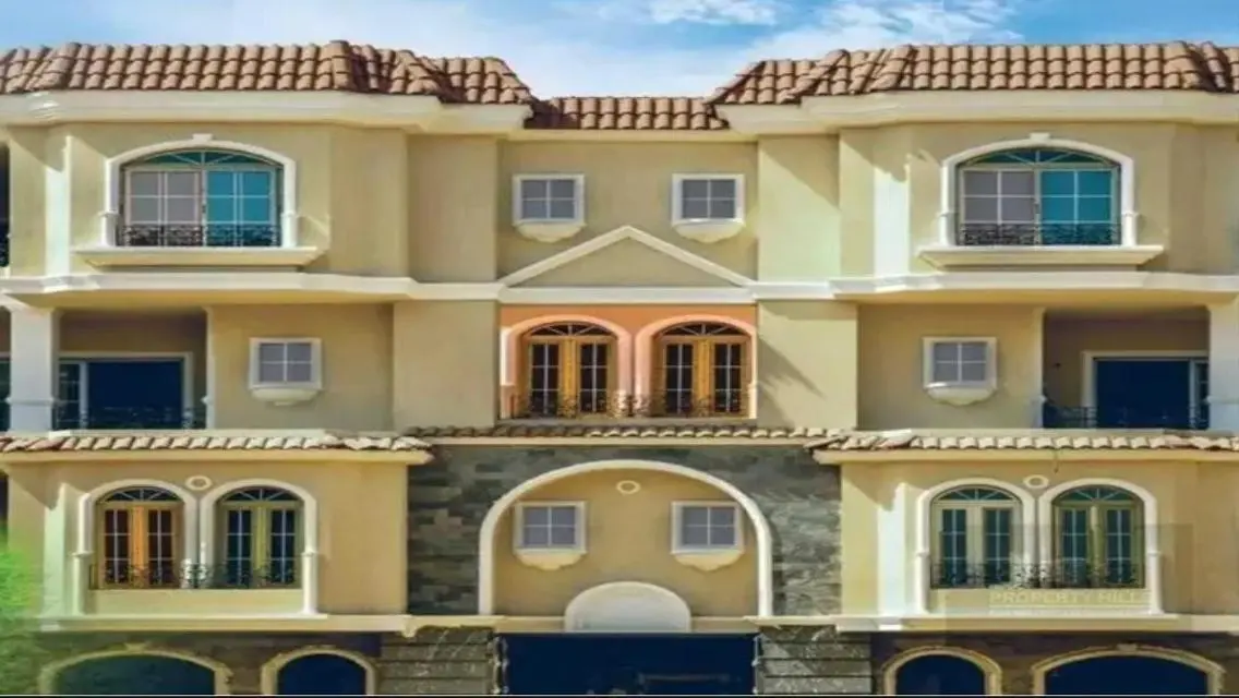 Luxurious Apartment with Spacious Garden and Shared Pool in the City Center