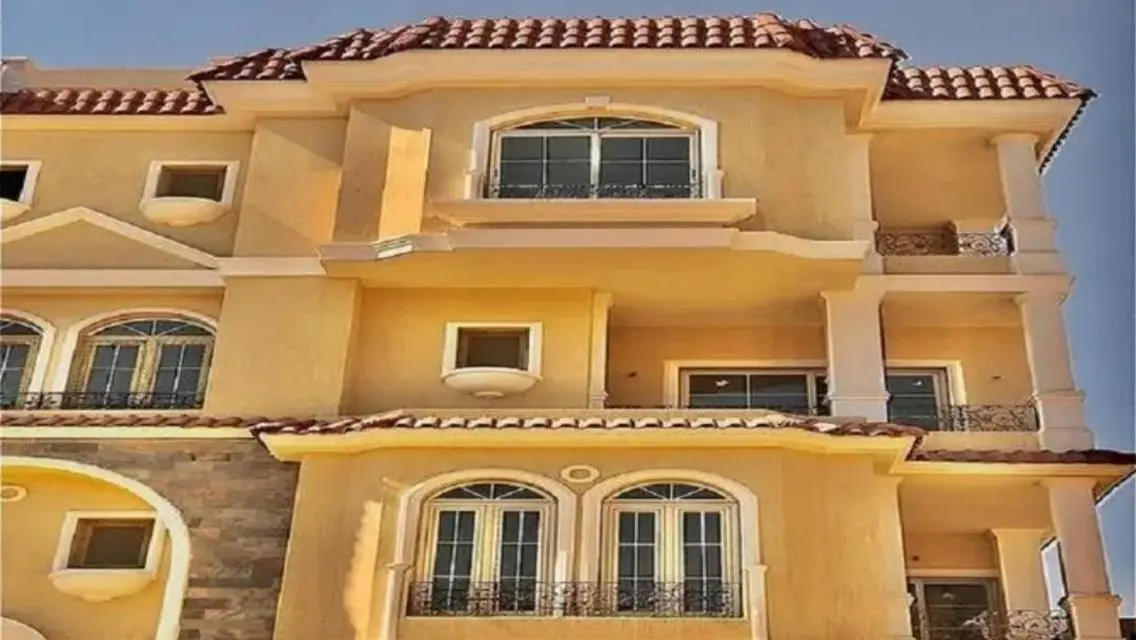 Luxurious Apartment with Spacious Garden and Shared Pool in the City Center