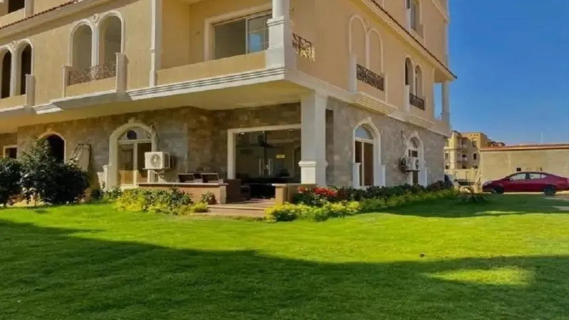 Luxurious Apartment with Spacious Garden and Shared Pool in the City Center