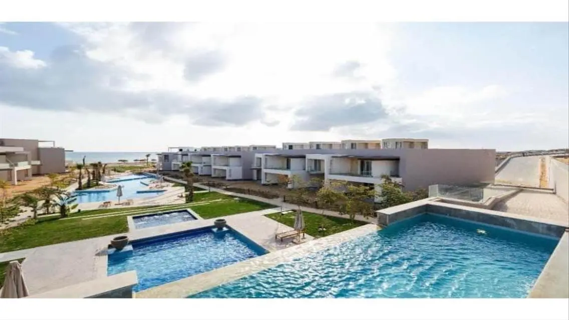 Luxury Apartment with Private Garden and Shared Pool