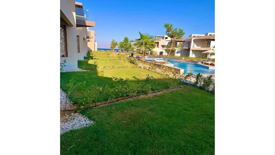 Luxury Apartment with Private Garden and Shared Pool