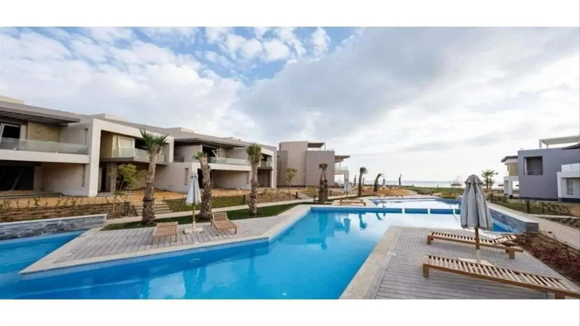 Luxury Apartment with Private Garden and Shared Pool