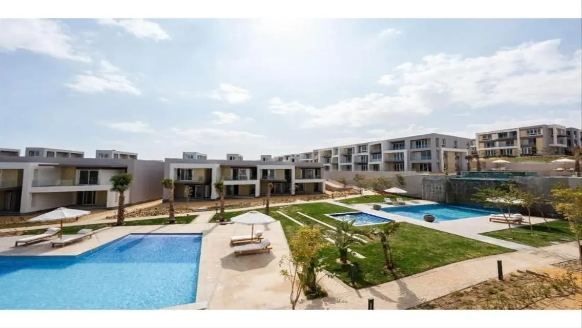 Luxury Apartment with Private Garden and Shared Pool