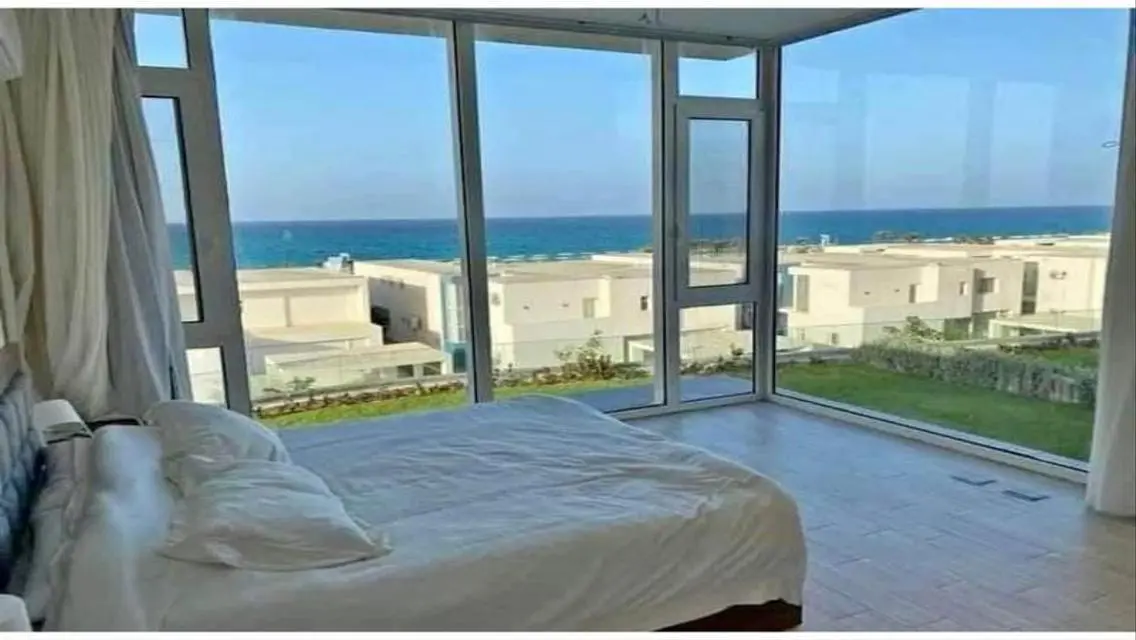 Luxury Apartment with Private Garden and Shared Pool