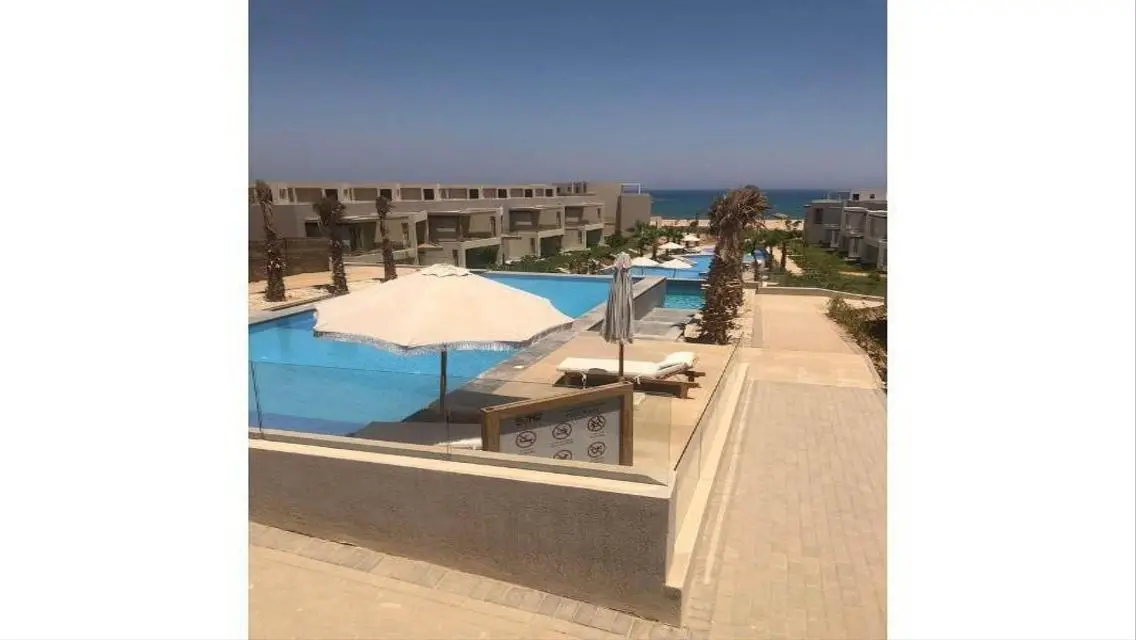 Luxury Apartment with Private Garden and Shared Pool