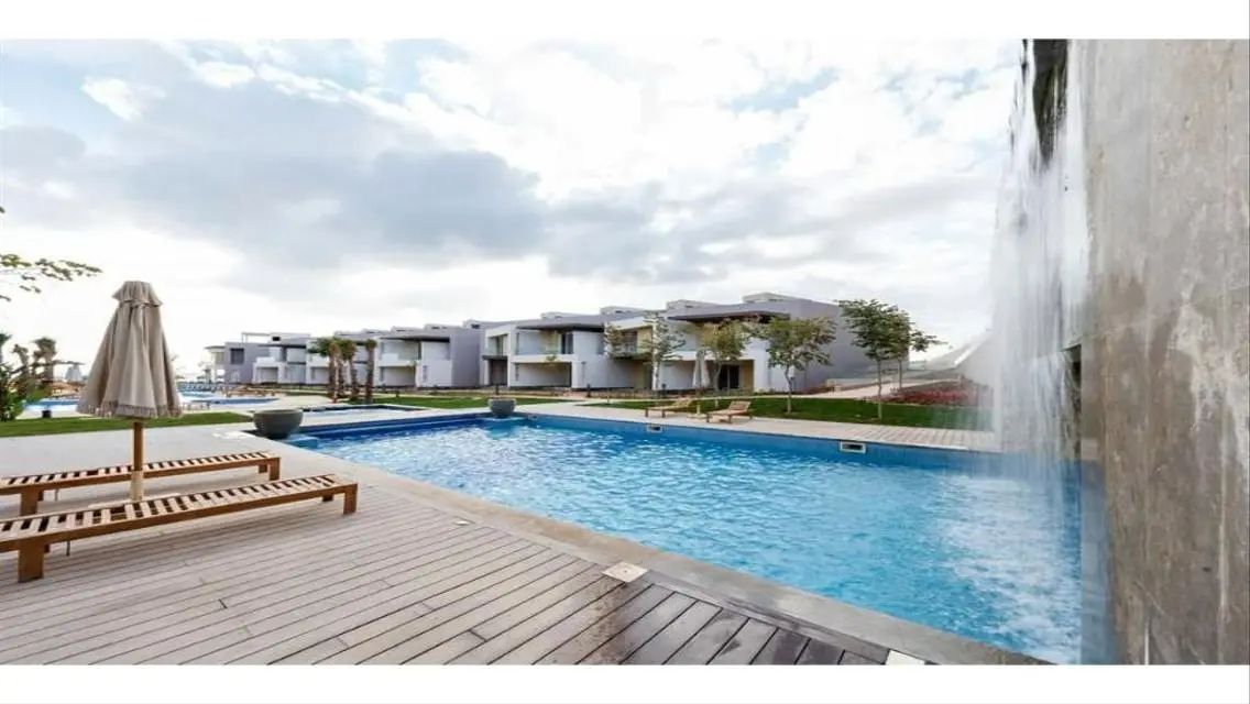 Luxury Apartment with Private Garden and Shared Pool