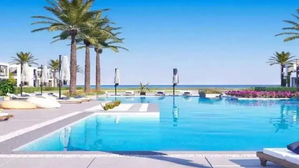 Luxury Apartment with Private Garden and Shared Pool