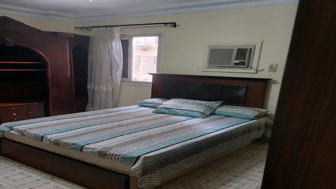 Stunning Apartment with Spacious Design and Central AC in Prime Location