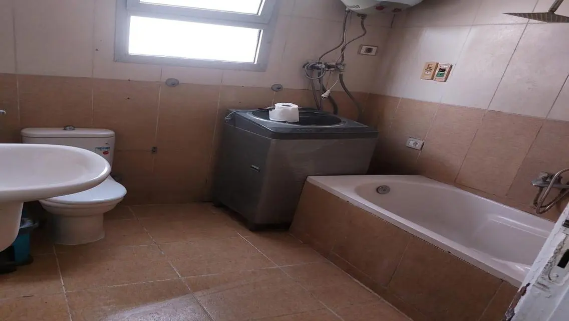 Stunning Apartment with Spacious Design and Central AC in Prime Location