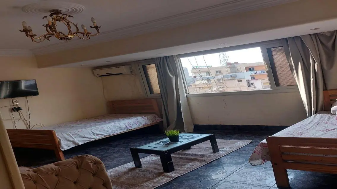 Stunning Apartment with Spacious Design and Central AC in Prime Location