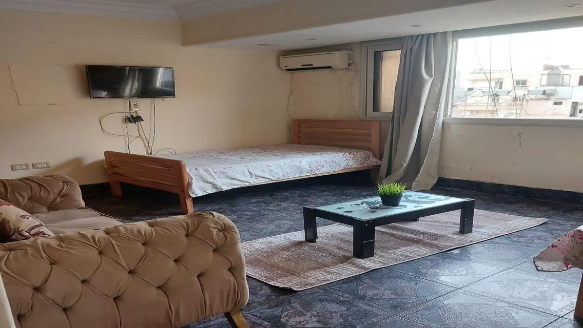 Stunning Apartment with Spacious Design and Central AC in Prime Location