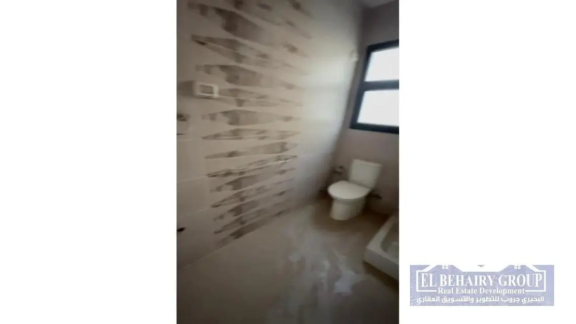 Luxurious Apartment with Spacious Garden in Prime Location