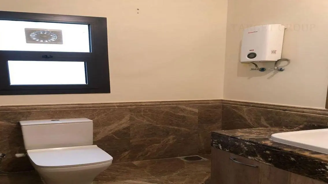 Apartment for rent in Mivida Compound Kitchen&amp;AC
