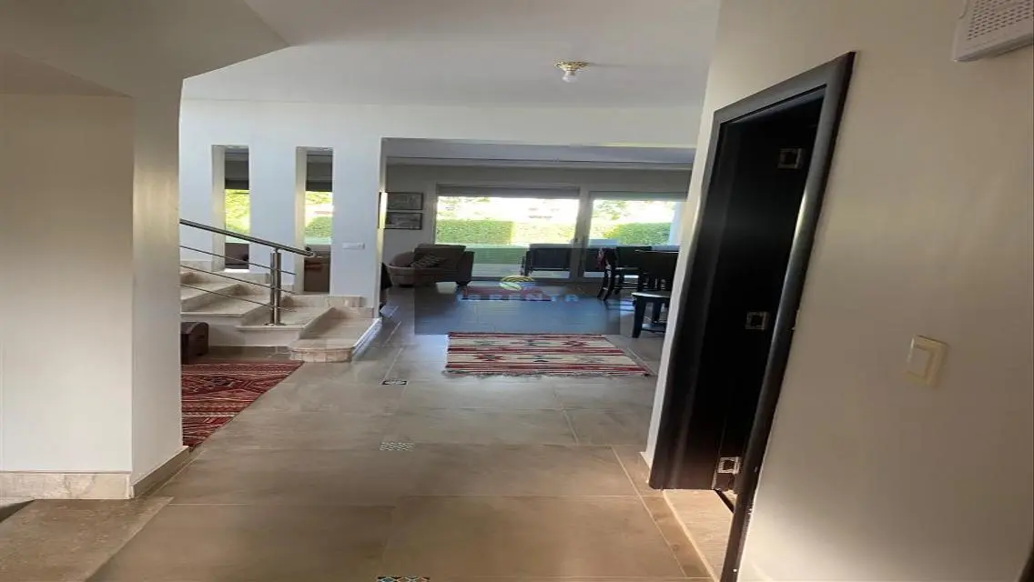 Luxury Villa with Private Garden and Shared Pool