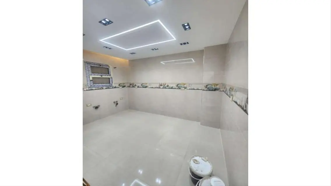 Luxury Apartment with Private Garden for Sale in Premier Location