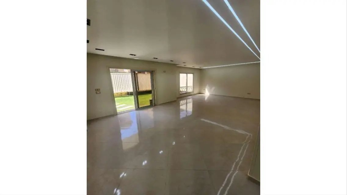 Luxury Apartment with Private Garden for Sale in Premier Location
