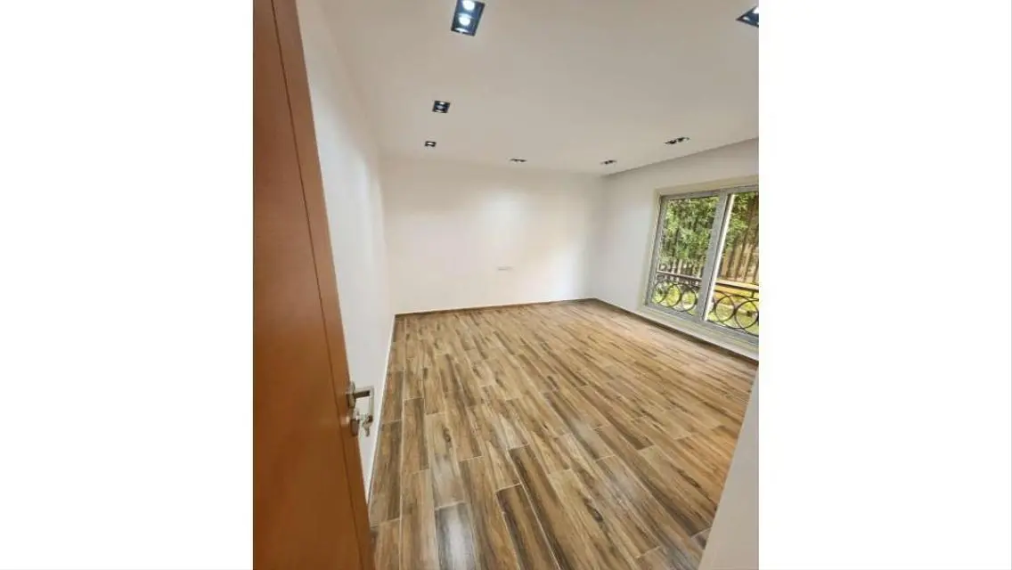 Luxury Apartment with Private Garden for Sale in Premier Location