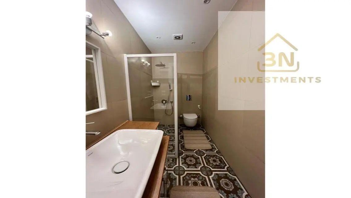 Three-in-One Investment - Luxury Unit for Sale