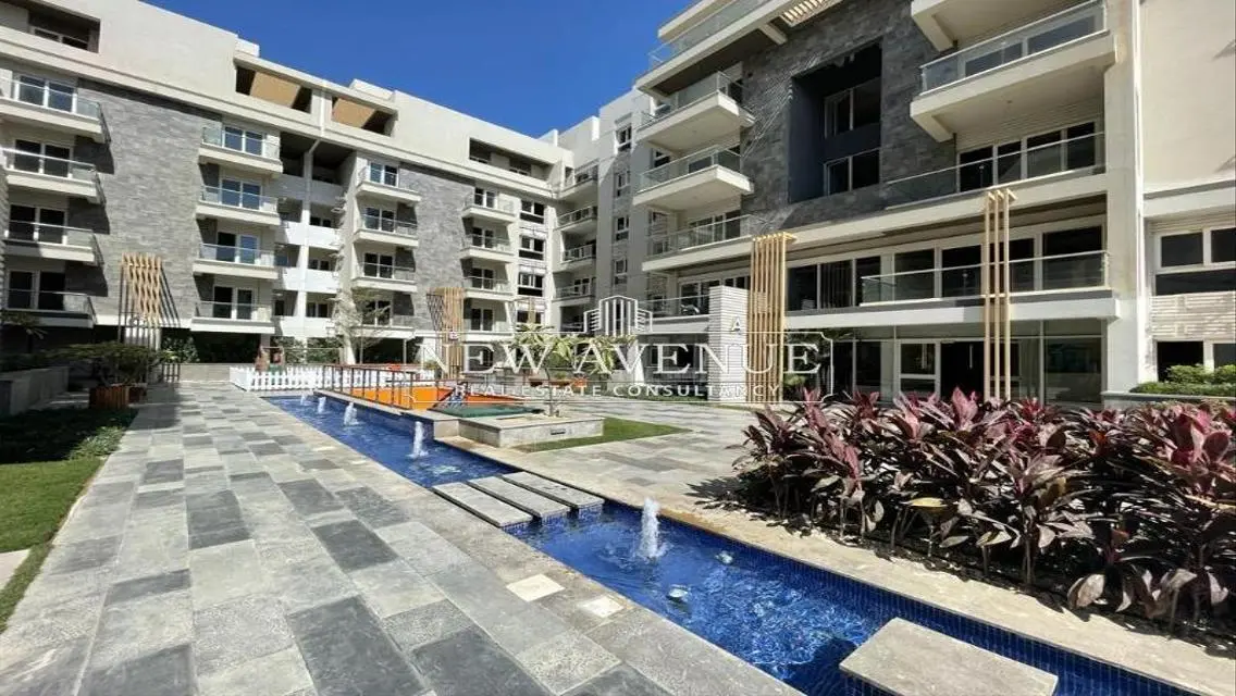 Luxury Apartment with Spacious Private Garden and Shared Pool